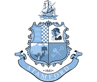 The image displays a coat of arms with various elements such as a shield, crest, and motto, which are characteristic features of heraldry.